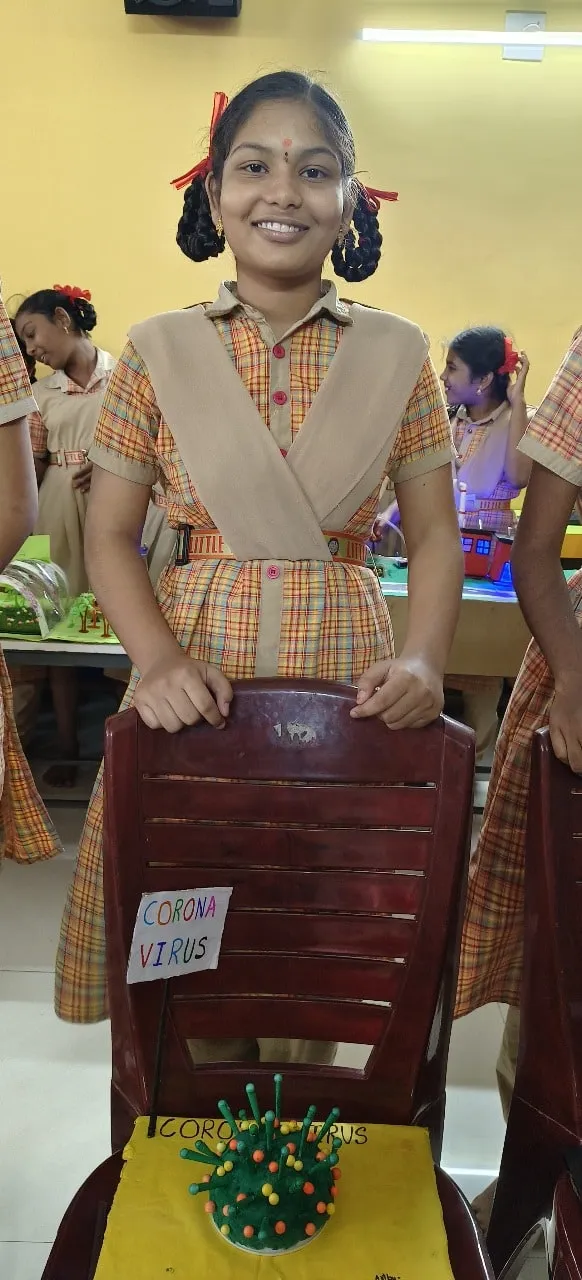 Science exhibition — a student with a model.